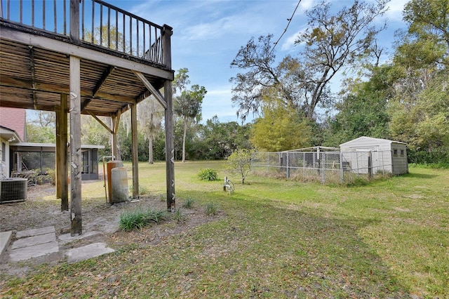 view of yard featuring central AC unit