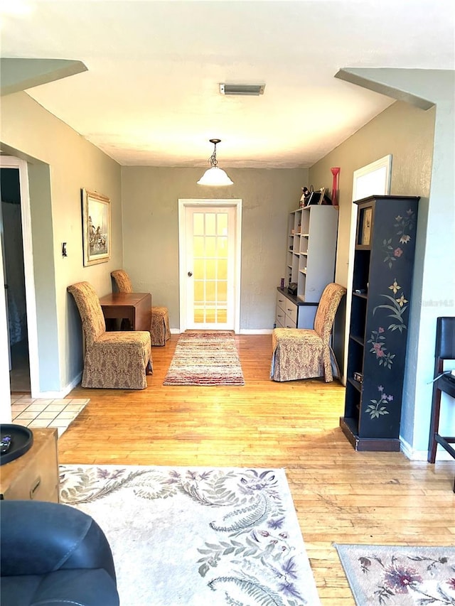 living room with hardwood / wood-style floors