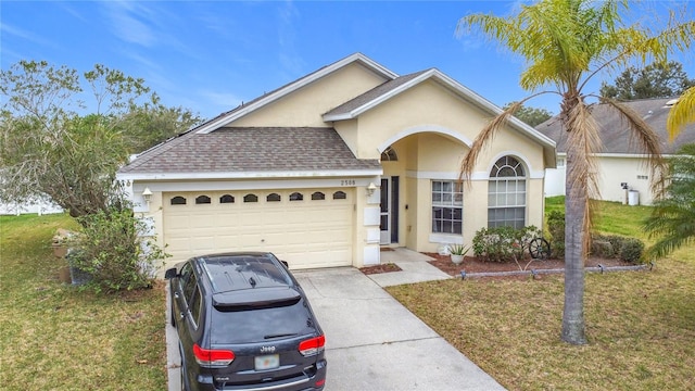 single story home featuring a garage and a front lawn