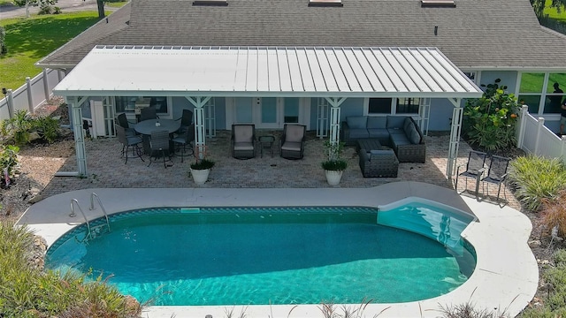 view of swimming pool with an outdoor hangout area and a patio