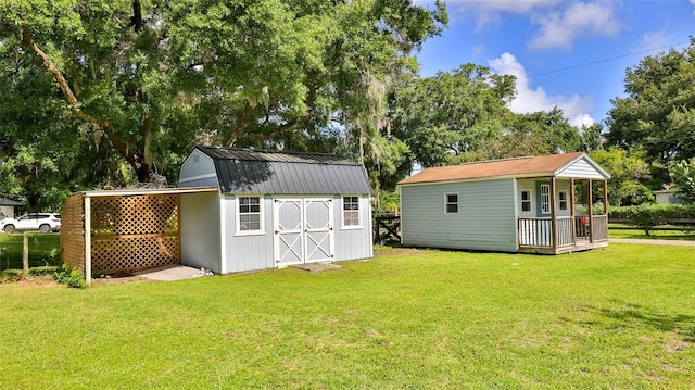 view of outdoor structure with a yard