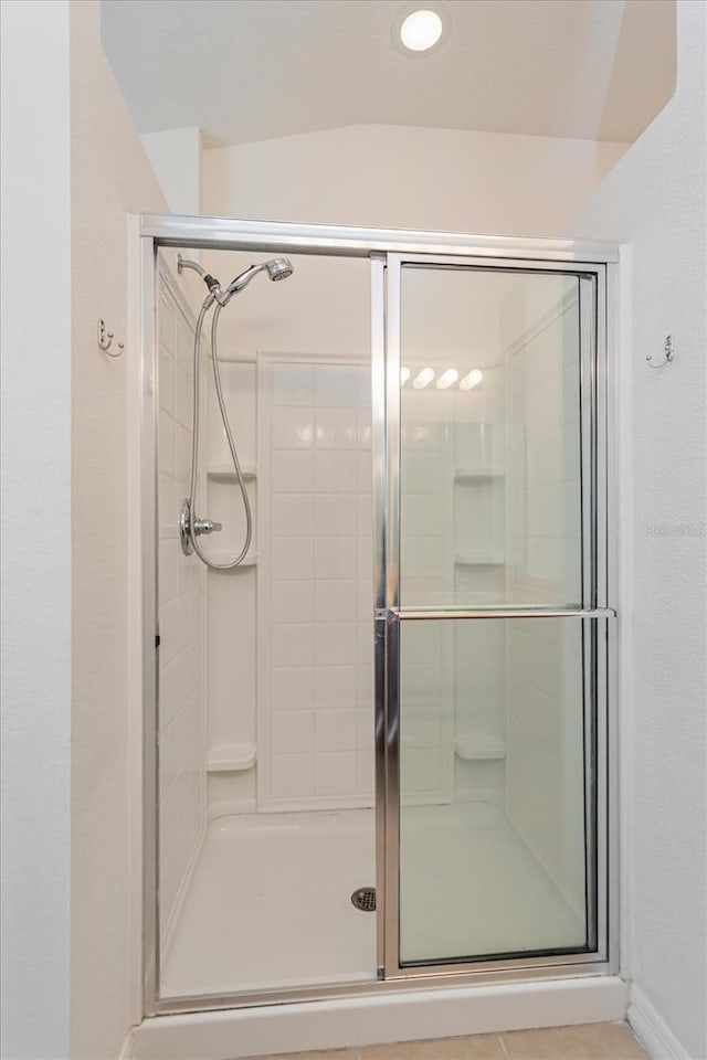 bathroom with an enclosed shower