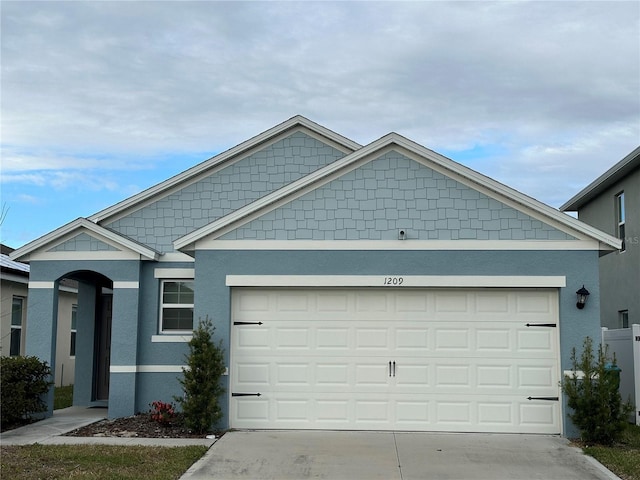 view of front of property featuring a garage