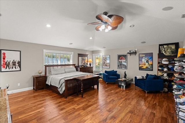 bedroom featuring ceiling fan and wood-type flooring