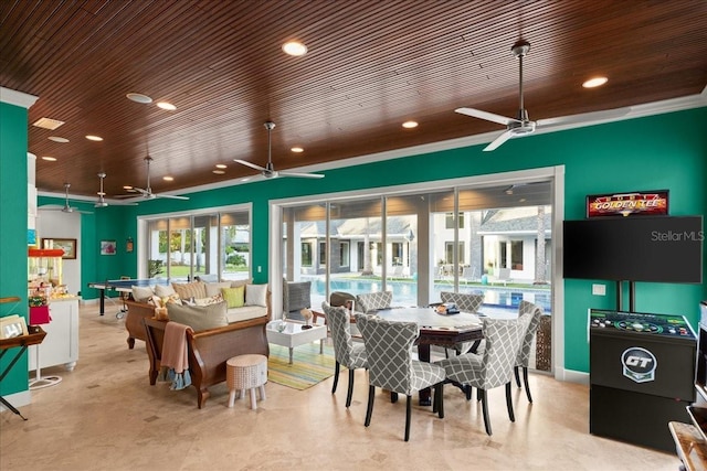 dining area with ceiling fan, crown molding, and wooden ceiling