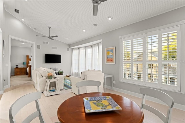 dining space featuring ceiling fan, light hardwood / wood-style flooring, lofted ceiling, and wood ceiling