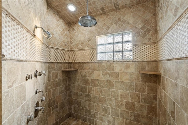 bathroom featuring tiled shower