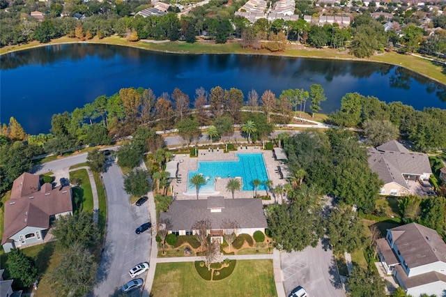 birds eye view of property with a water view