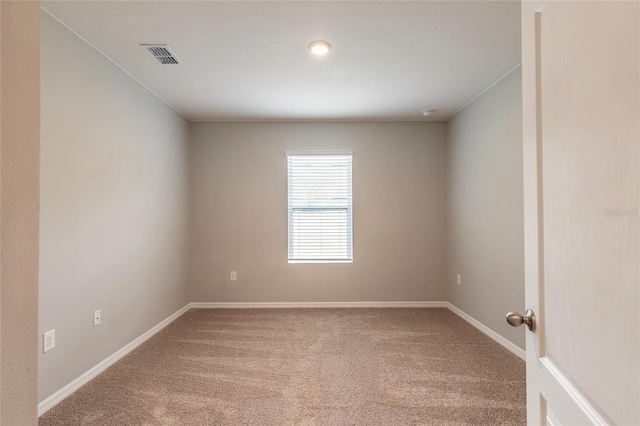 empty room featuring carpet