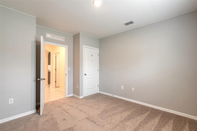 unfurnished bedroom featuring carpet flooring