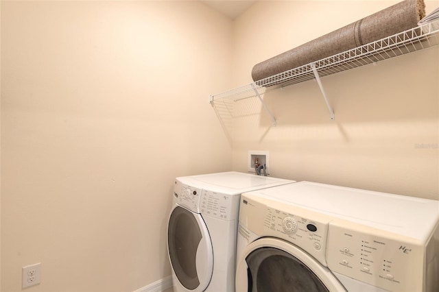 washroom featuring separate washer and dryer