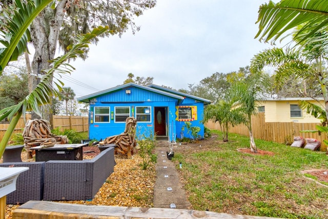 view of front of home with an outdoor structure