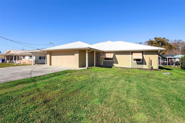 single story home with a front yard and a garage