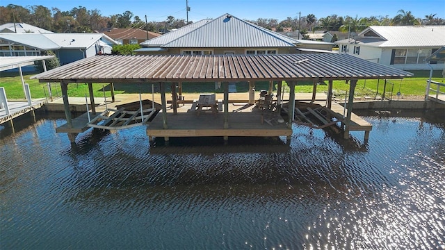 view of dock with a water view