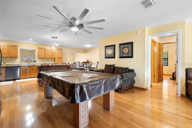 game room with ceiling fan, light hardwood / wood-style floors, pool table, and sink