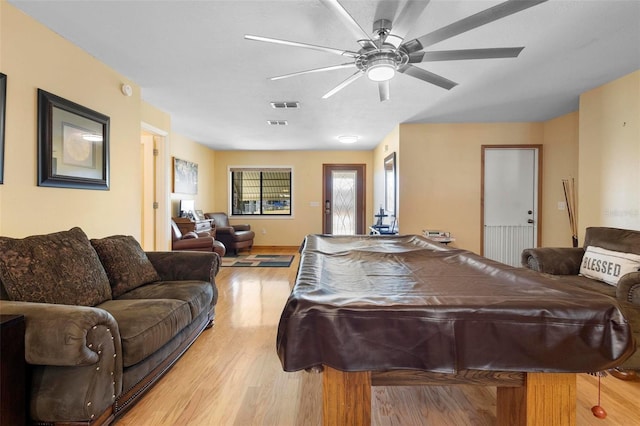 recreation room featuring light hardwood / wood-style floors, pool table, and ceiling fan