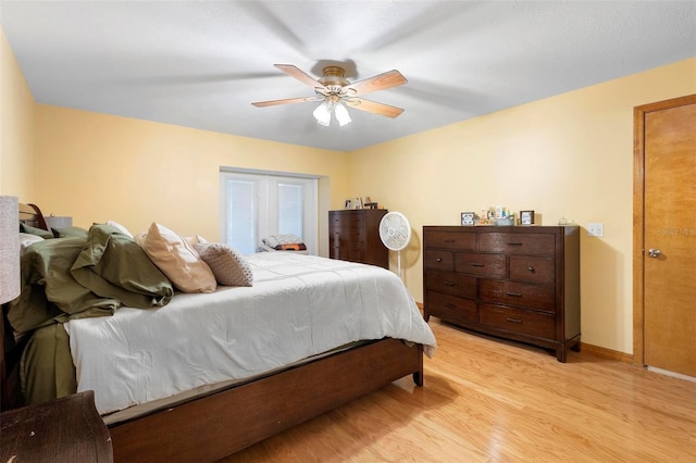 bedroom featuring ceiling fan and light wood-type flooring