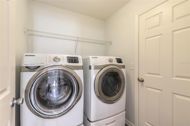 laundry area with washer and clothes dryer