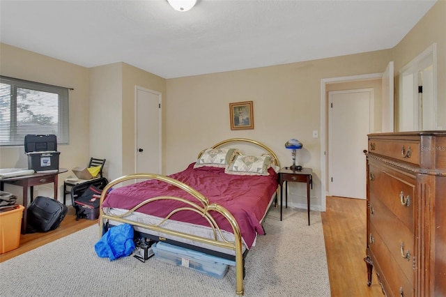 bedroom featuring light hardwood / wood-style flooring