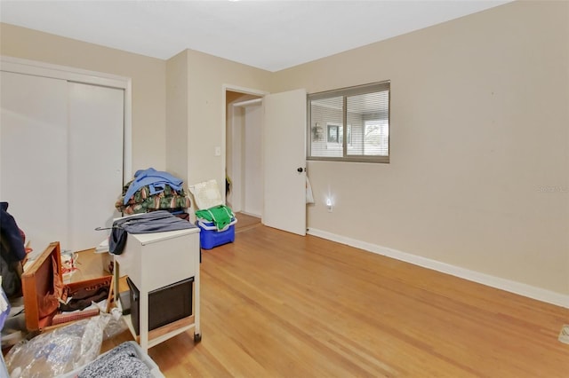 miscellaneous room featuring wood-type flooring