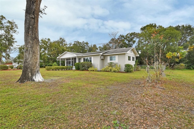 view of front of home with a front yard