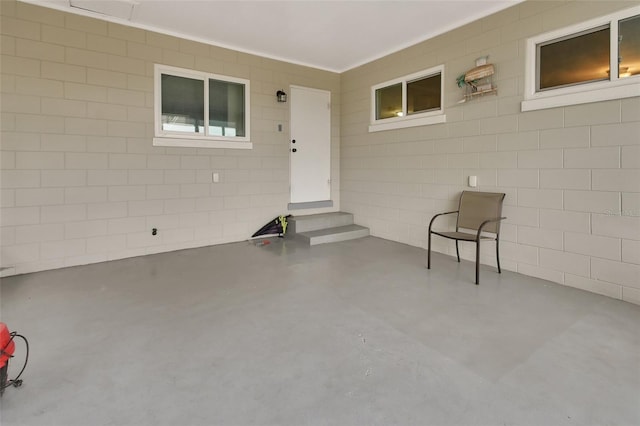 doorway to property featuring a patio area