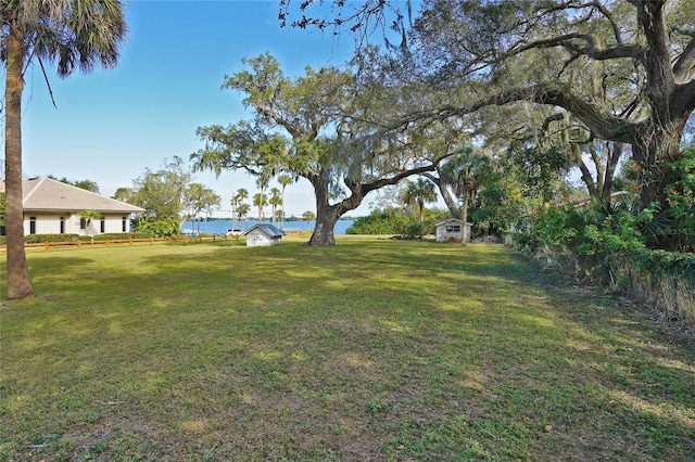 view of yard with a water view