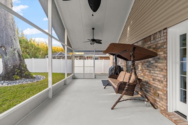 sunroom / solarium with ceiling fan