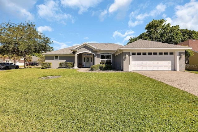 ranch-style house with a front lawn and a garage