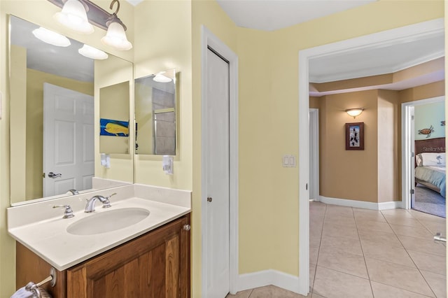 bathroom with vanity and tile patterned floors