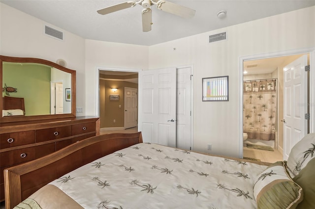 bedroom with ceiling fan, a closet, and ensuite bath