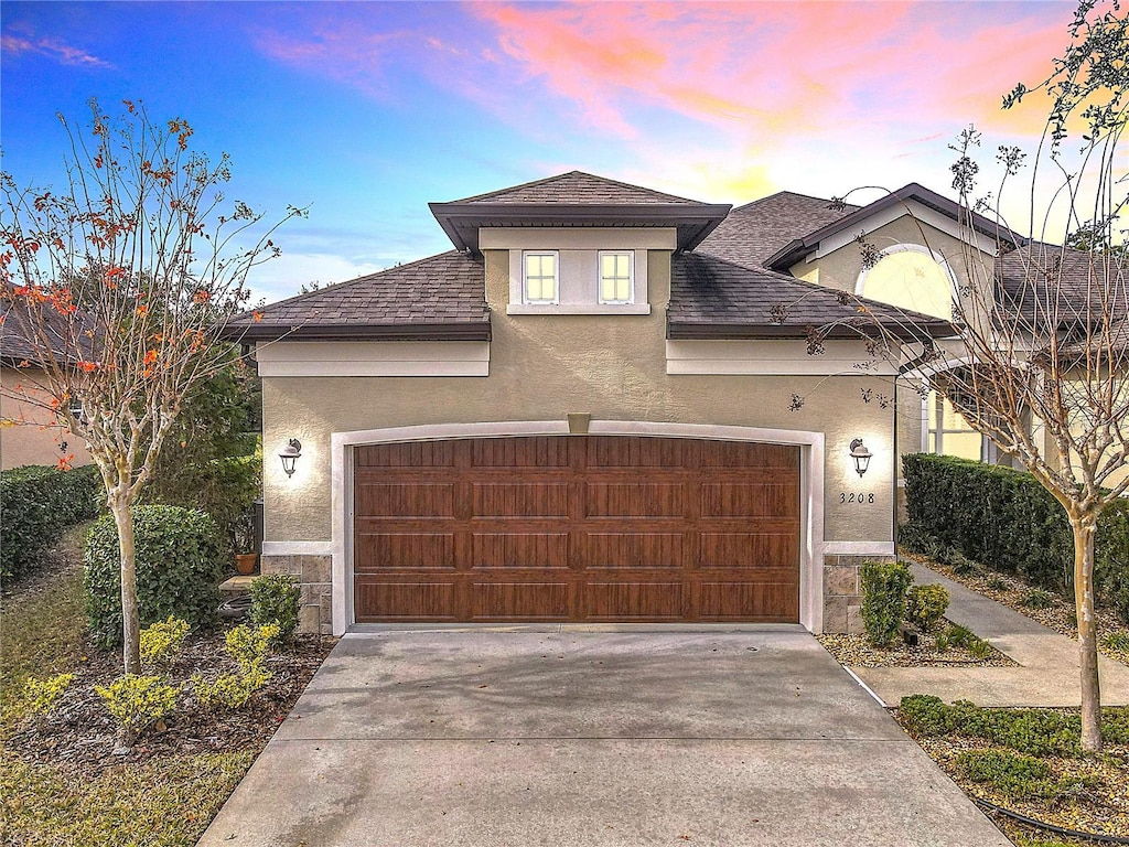 view of front of house with a garage