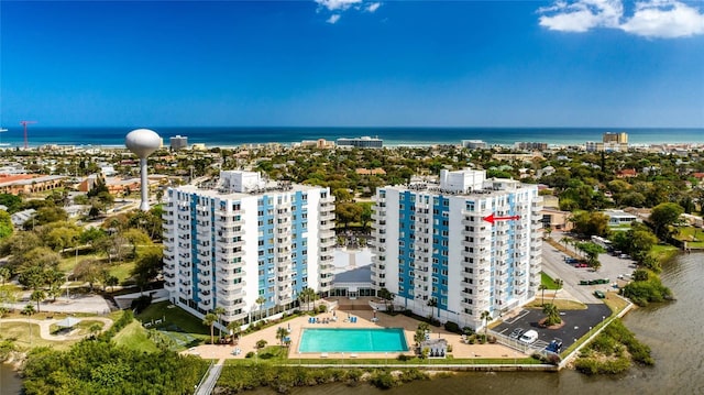 birds eye view of property featuring a water view