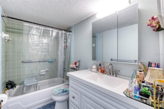 full bathroom with vanity, shower / bath combo, toilet, and a textured ceiling