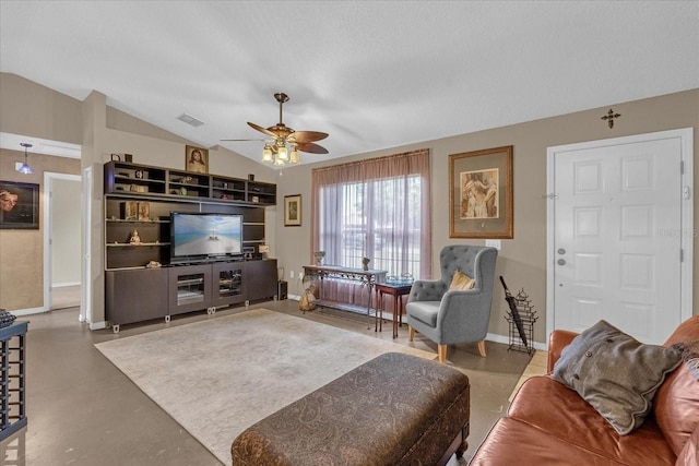 living room with vaulted ceiling, ceiling fan, and concrete flooring