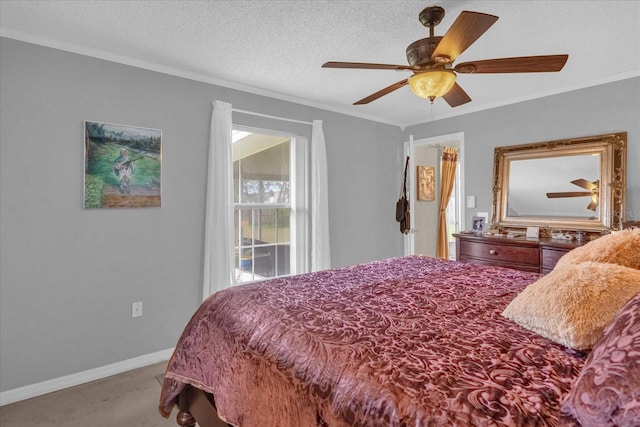 bedroom featuring carpet, a textured ceiling, ceiling fan, and ornamental molding