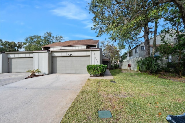 exterior space with a lawn and a garage