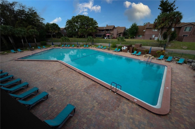 view of pool featuring a patio