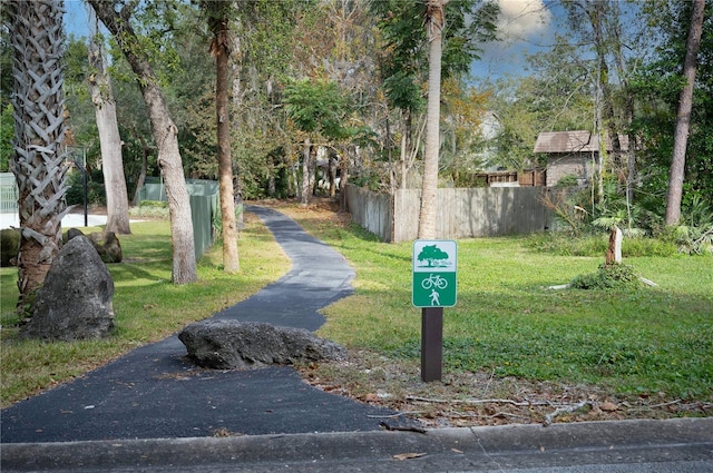 surrounding community with a lawn