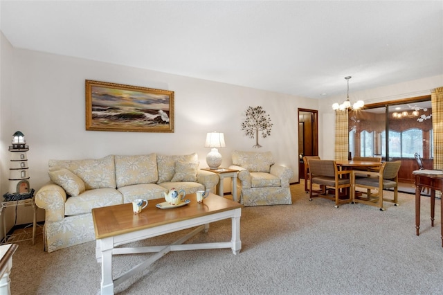 carpeted living room with a notable chandelier