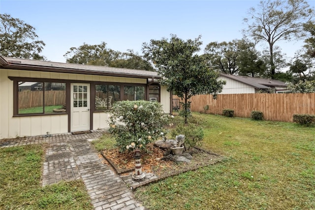 exterior space featuring a front yard