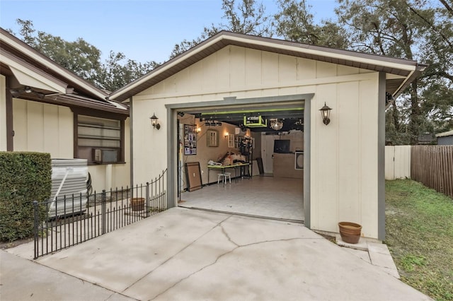 exterior space with an outdoor structure and a garage