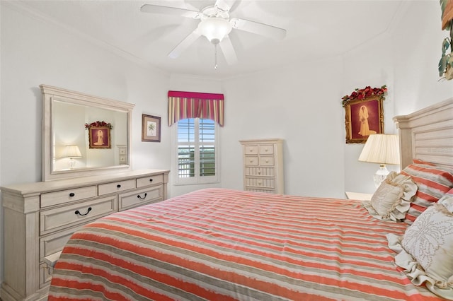 bedroom with crown molding and ceiling fan