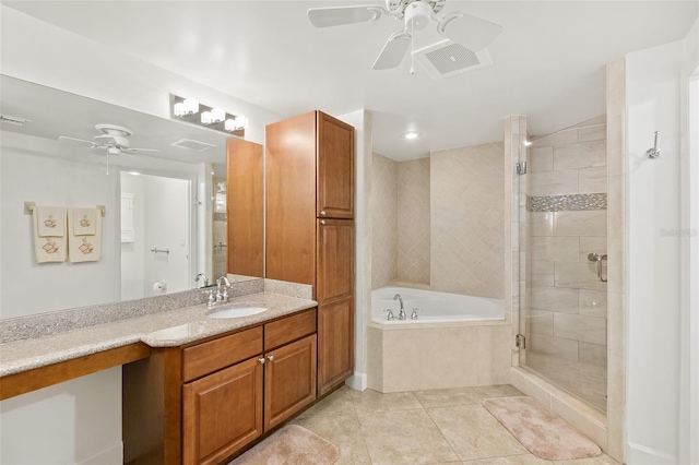 bathroom featuring tile patterned flooring, vanity, independent shower and bath, and ceiling fan