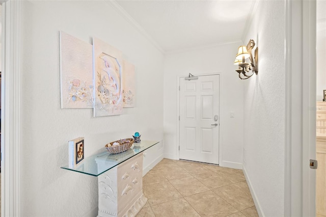 doorway with crown molding and light tile patterned floors