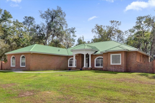 view of front of property with a front lawn