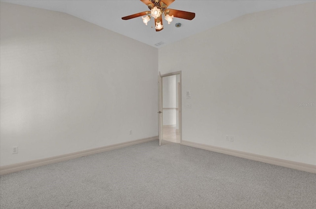 empty room with vaulted ceiling and ceiling fan