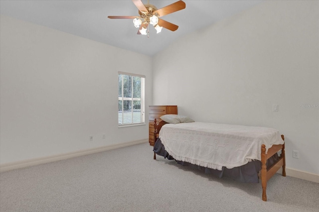 carpeted bedroom with ceiling fan and lofted ceiling