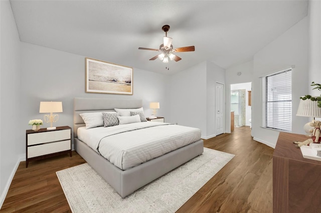 bedroom with dark hardwood / wood-style flooring, ceiling fan, and a closet