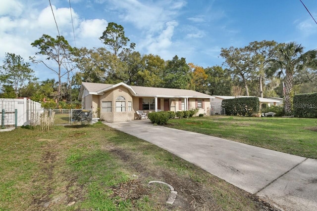 single story home with a front yard